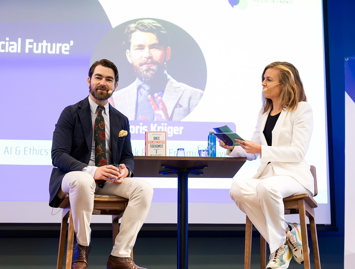 Joris Krijger with Irene Rompa at Leaders in Finance AI Event discussing Onze Kunstmatige Toekomst